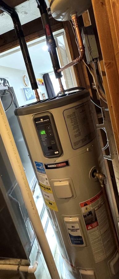 New Bradford White AeroTherm heat pump water heater installed with new copper connections