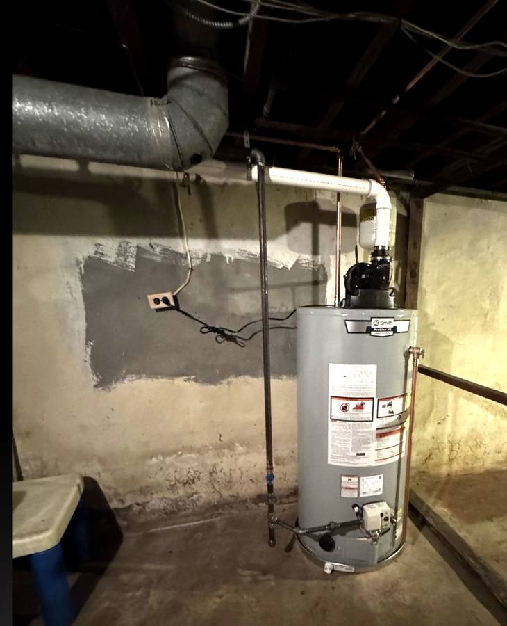 New A. O. Smith power-vent gas water heater with PVC venting and new copper connections