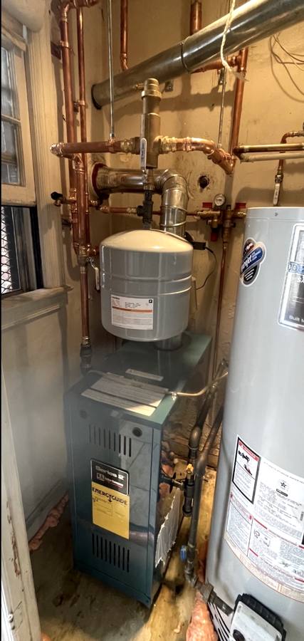 New U.S. Boiler Series 2 boiler with rebuilt copper near-boiler piping, expansion tank and stainless flue