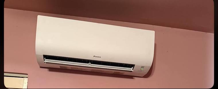 Second wall-mounted Daikin ductless indoor head installed in another room